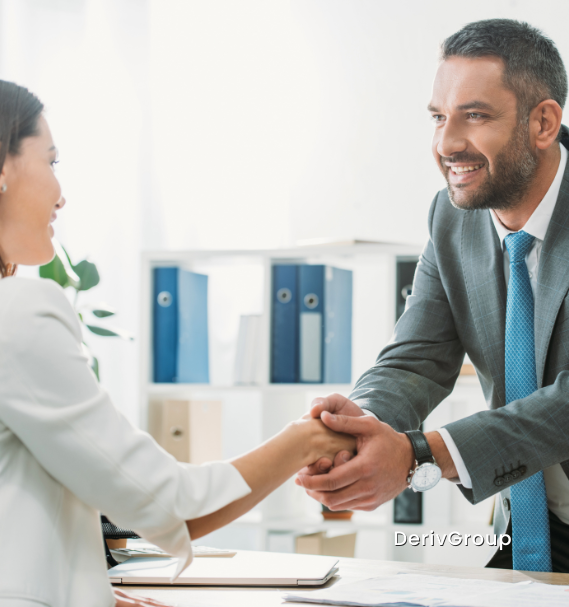 financial advisor shaking clients hand financial advisor shaking clients hand