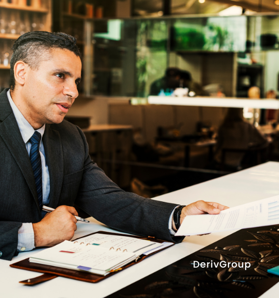 protecting against rising interest rates business leader reviewing interest rate cap documents and financial charts in a secure office environment